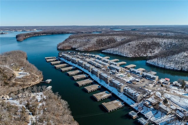 birds eye view of property featuring a water view