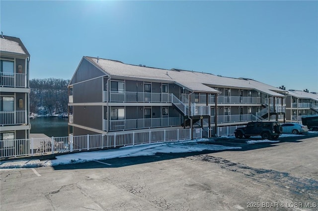 view of building exterior with a water view