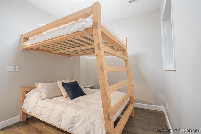 bedroom featuring hardwood / wood-style flooring