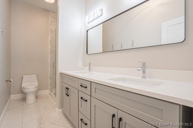 bathroom with an enclosed shower, vanity, and toilet