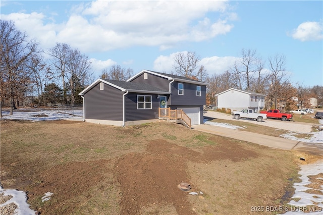 split level home with a garage