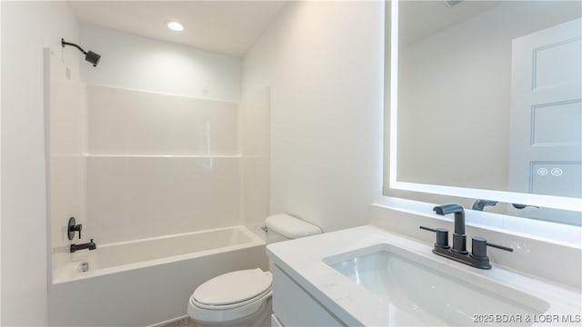 full bathroom with shower / bathing tub combination, vanity, and toilet