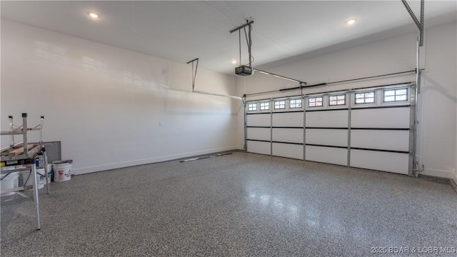 garage featuring a garage door opener