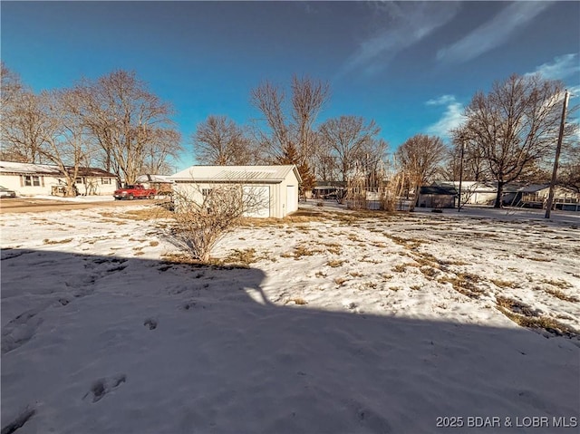 view of snowy yard