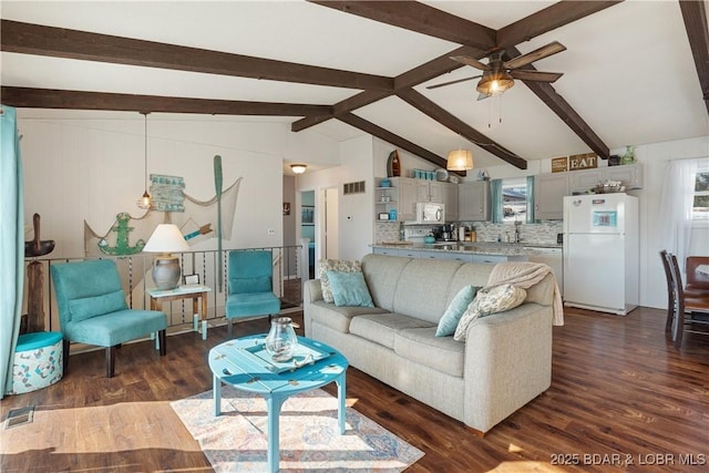 living room featuring ceiling fan, dark hardwood / wood-style flooring, and lofted ceiling with beams