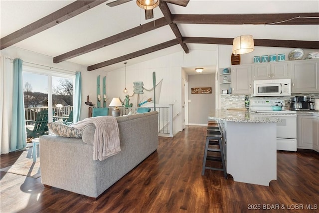 living room featuring dark hardwood / wood-style floors, vaulted ceiling with beams, and ceiling fan