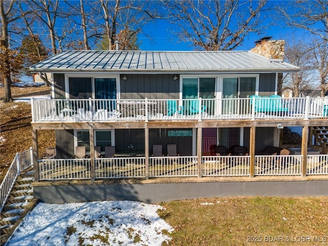 view of front of property with a wooden deck