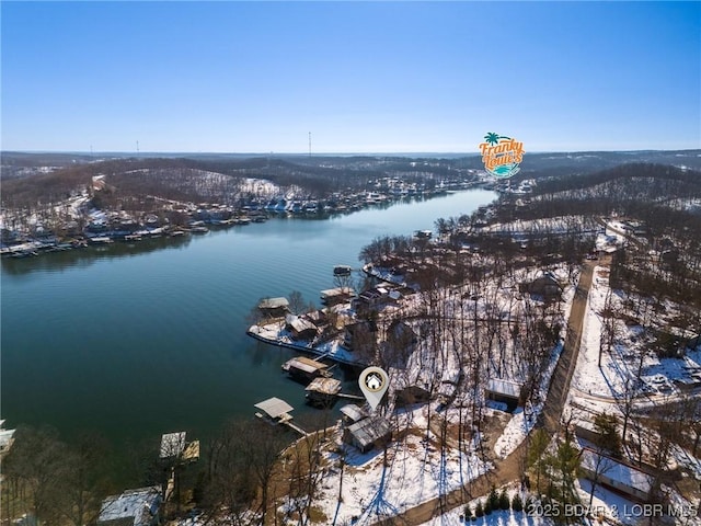 drone / aerial view with a water view