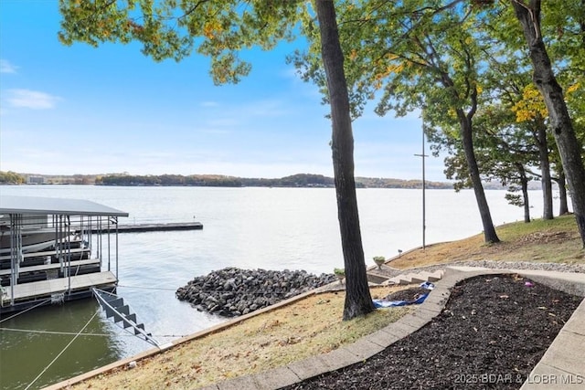 view of dock with a water view