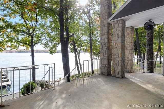 view of patio / terrace with a water view