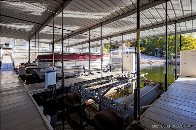 view of dock with a water view