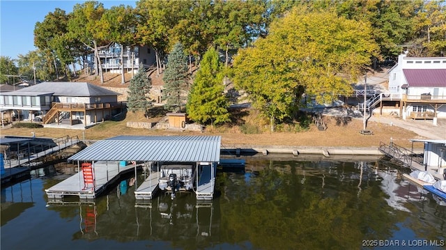 dock area featuring a water view