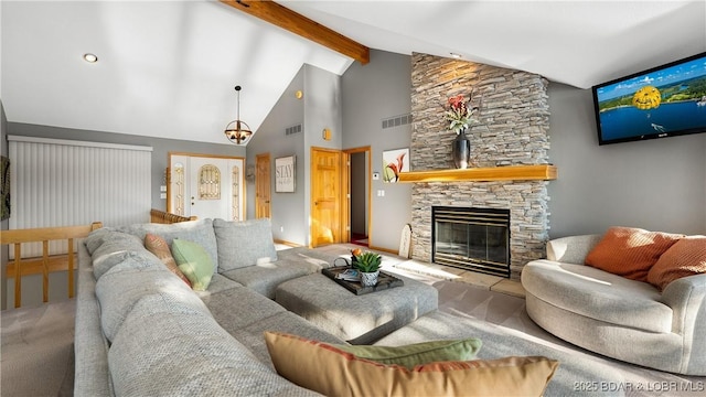 carpeted living room with a fireplace, high vaulted ceiling, and beamed ceiling