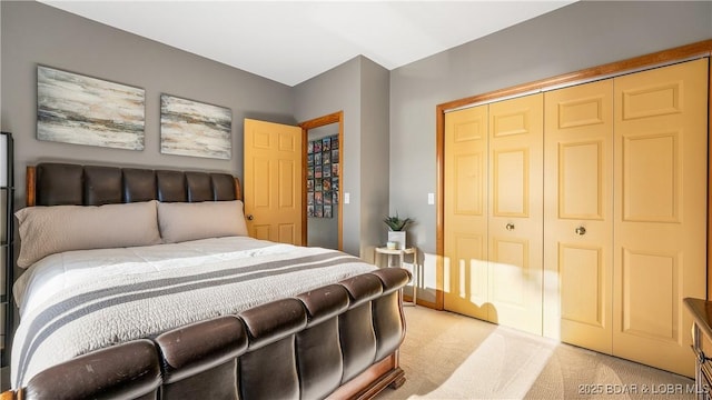 carpeted bedroom featuring a closet