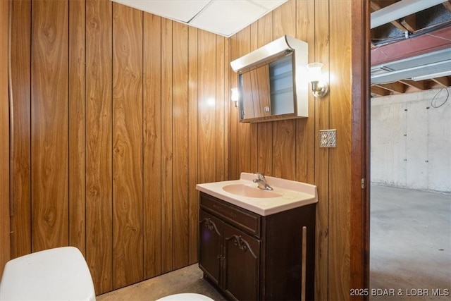 bathroom featuring concrete floors and vanity