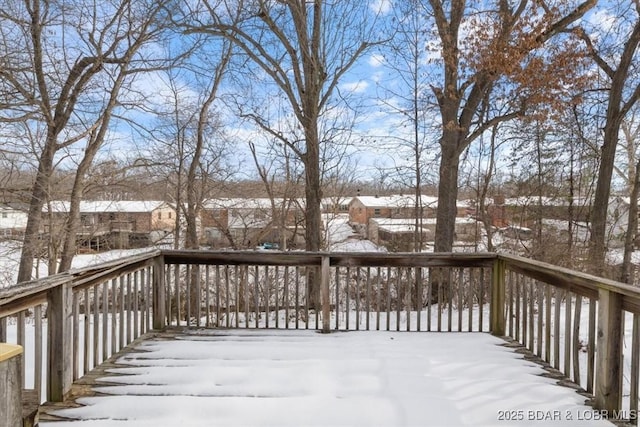 view of snow covered deck