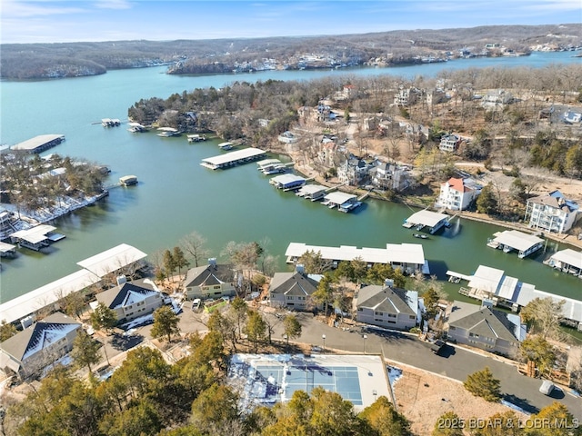 drone / aerial view with a water view