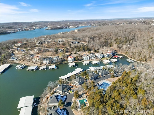 birds eye view of property featuring a water view