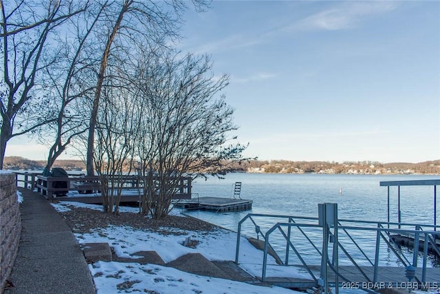 view of dock with a water view