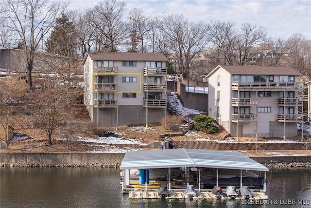 view of building exterior with a water view