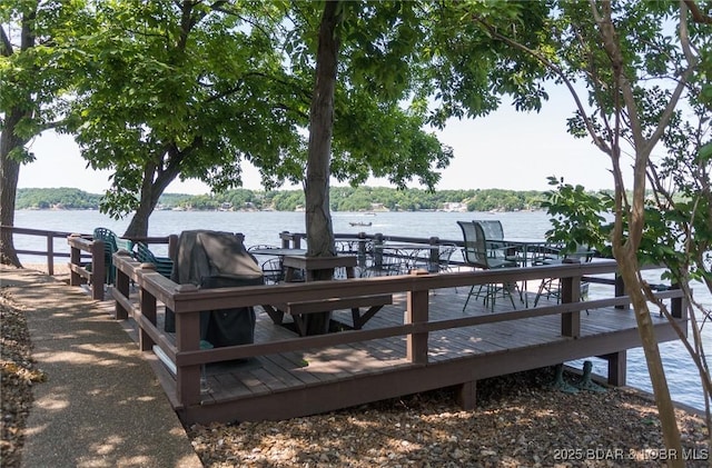 16 Hawk Harbor Ln Unit 2B, Lake Ozark, MO 65049 - dock featuring a water view