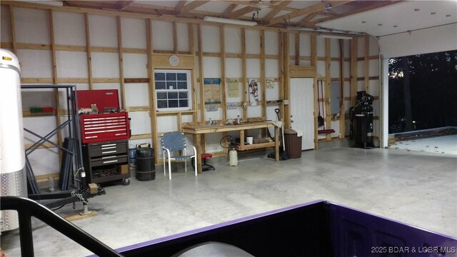 garage with a workshop area