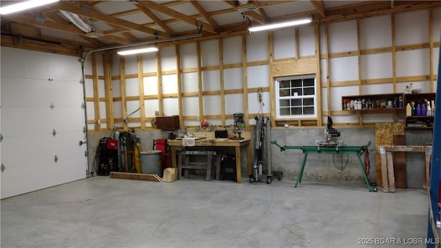 garage with a workshop area