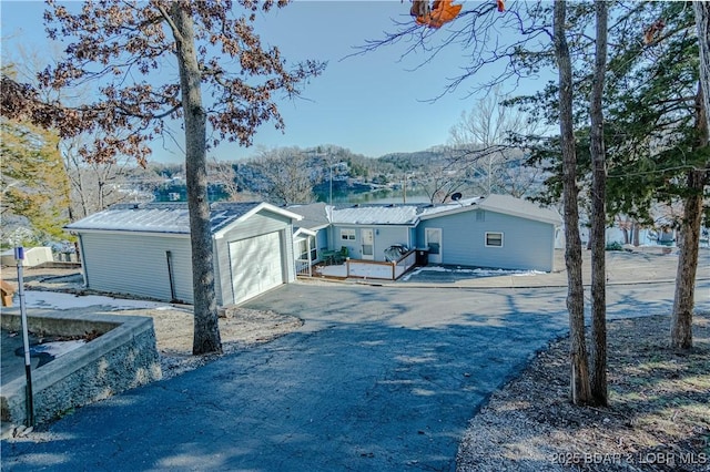 view of property exterior featuring a garage