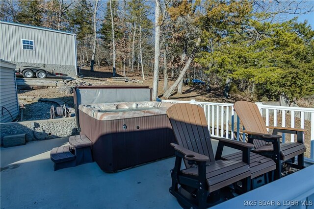 view of patio with a hot tub