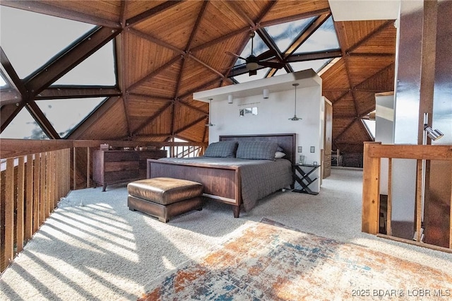 bedroom with vaulted ceiling, carpet, and wooden walls