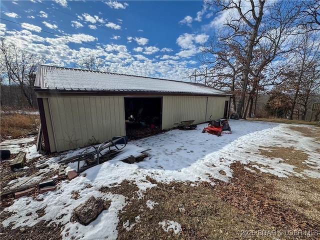 view of snow covered garage