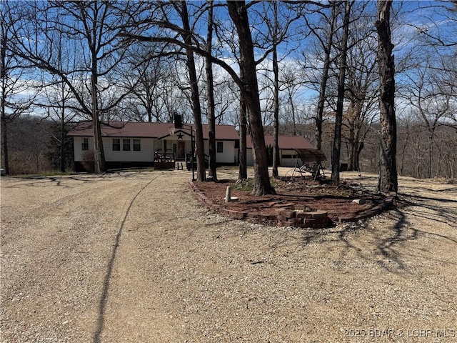 23731 Grant Rd, Barnett, MO 65011 - ranch-style home featuring a chimney