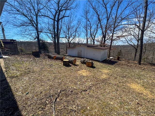 23731 Grant Rd, Barnett, MO 65011 - view of yard with a shed