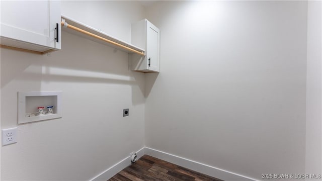 washroom with dark hardwood / wood-style flooring, washer hookup, hookup for an electric dryer, and cabinets