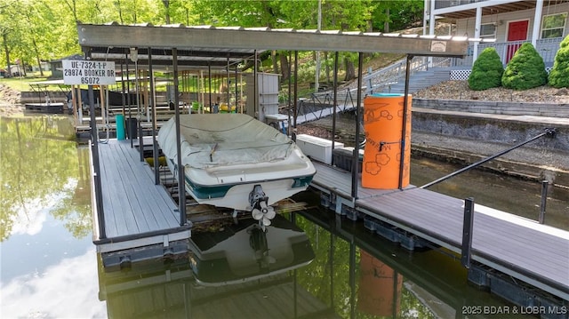 dock area featuring a water view