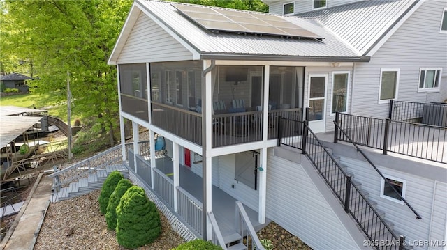 exterior space with a sunroom