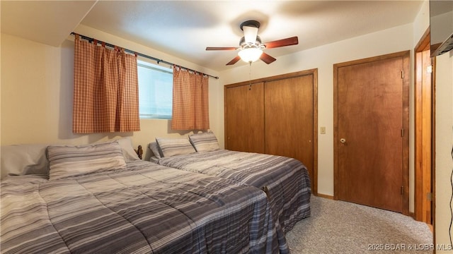 carpeted bedroom featuring ceiling fan