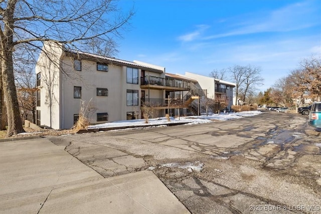 65 Laguna Dr Unit 1A/757, Lake Ozark, MO 65049 - view of building exterior with a residential view