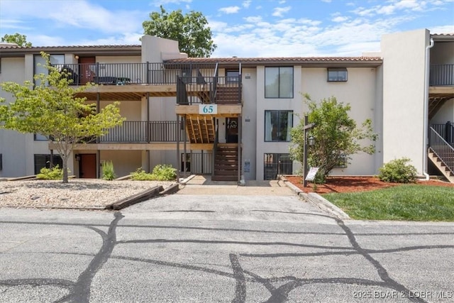 65 Laguna Dr Unit 1A/757, Lake Ozark, MO 65049 - view of property featuring stairs