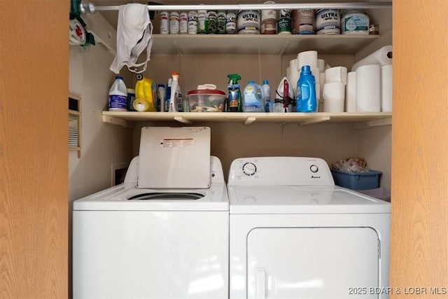 laundry area featuring washing machine and dryer