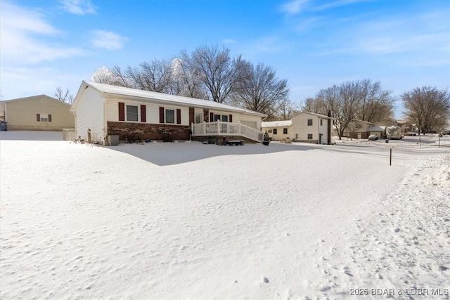 view of snow covered house