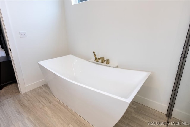 bathroom featuring a bathtub