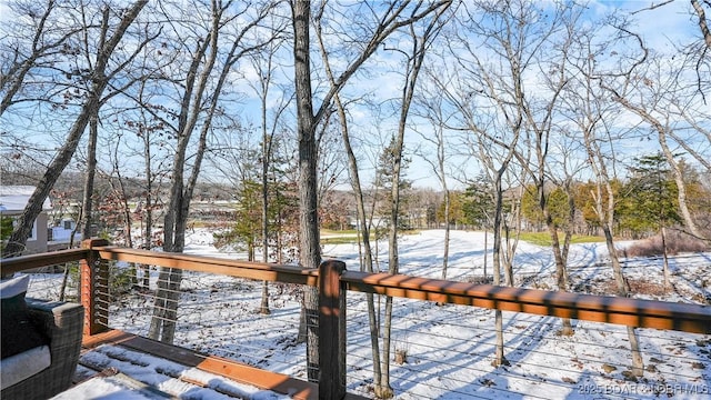 view of snow covered deck