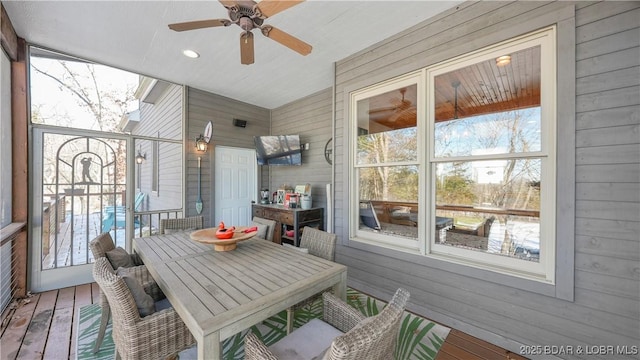 sunroom / solarium with ceiling fan