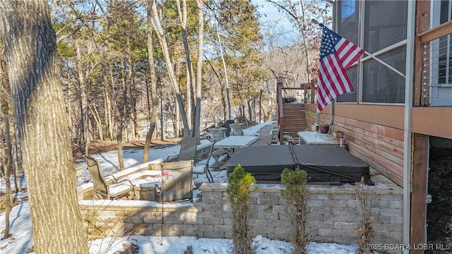 view of snow covered patio