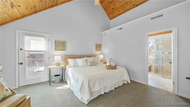 bedroom with wood ceiling, lofted ceiling, carpet flooring, ensuite bath, and baseboards