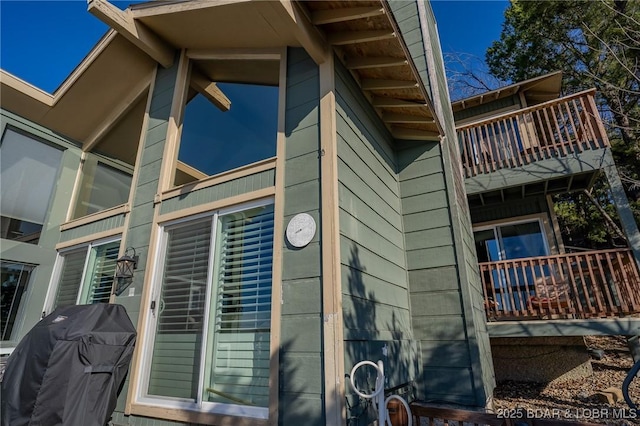 view of property exterior with a balcony