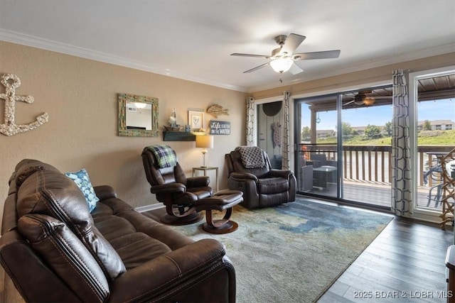 living room with ceiling fan, ornamental molding, and hardwood / wood-style floors