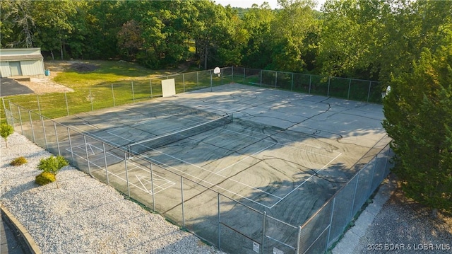 view of sport court with community basketball court and fence