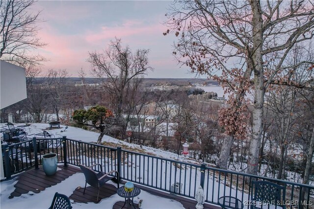 view of snow covered deck